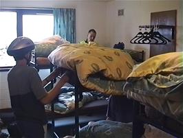 Tidying the duvets in our dorm at Torridon Youth Hostel